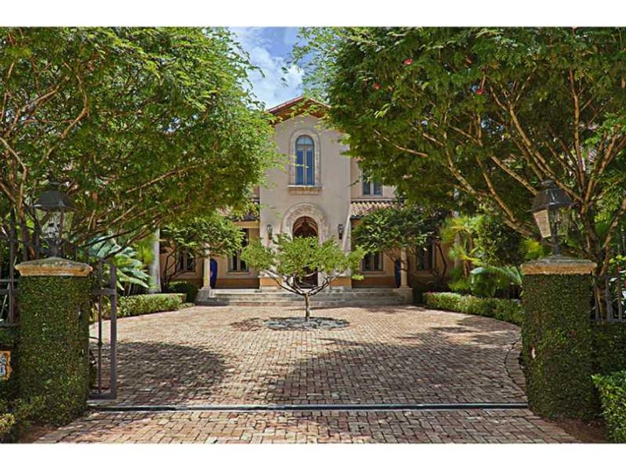 Crown Jewel of Paloma in Cocoplum, custom designed, on oversized 20,823 sf lot, only one neighbor. Great views of grounds w/flowering trees & bushes from full height windows & glass doors (HURD 2011, all impact). New 2012 chef's all white dream kitchen w/ Calacatta marble & SS appl., Viking, Miele, Sub zero. Spacious LR, banquet DR & paneled office, all open to terraces & pool. Chicago brick motorcourt. Private master & terrace. Large ground floor guest ste. Staff qrtrs. Side entrance driveway to garage.