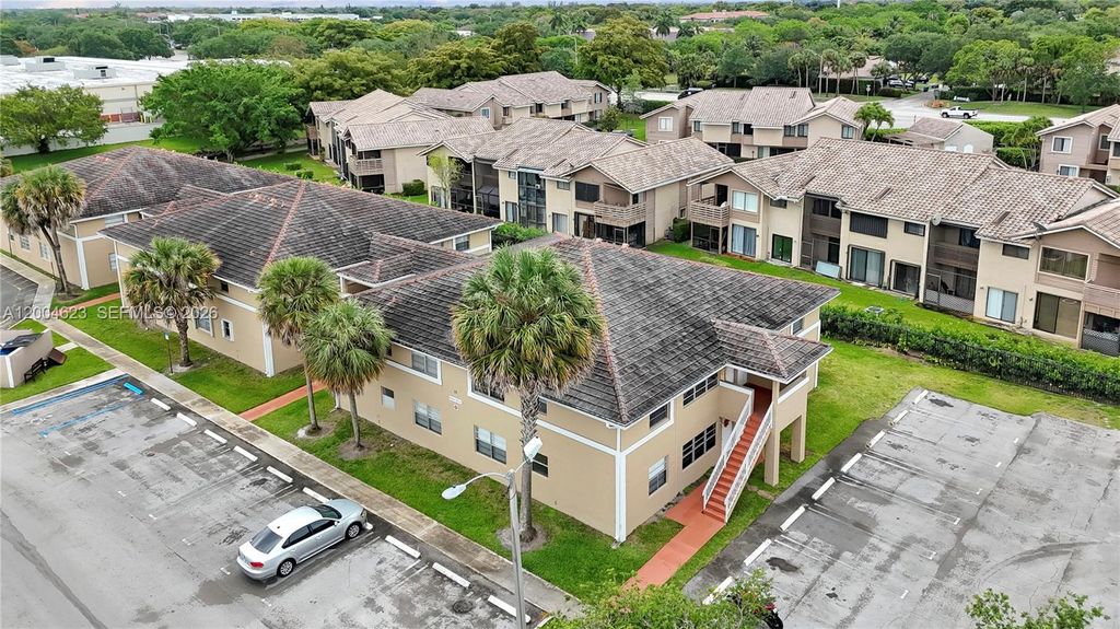 Photo of 9964 Twin Lakes Dr #35-B, Coral Springs, FL 33071 (MLS # A12004623)