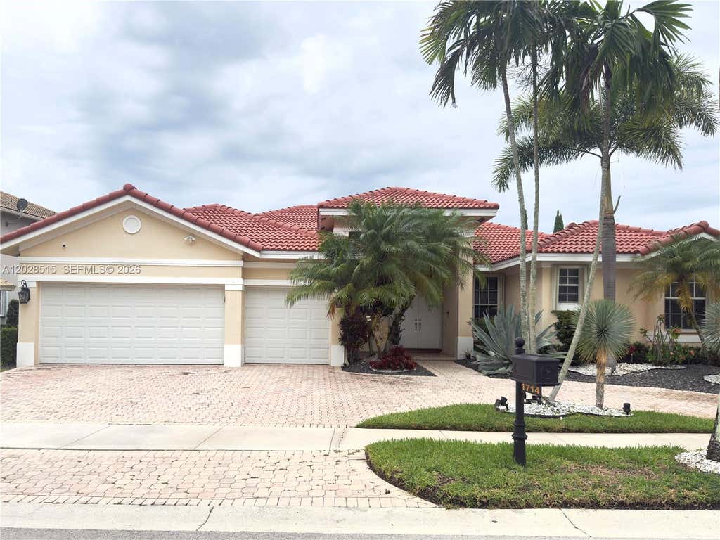 Photo of 1714 Victoria Pointe Cir, Weston, FL 33327 (MLS # A12028515)