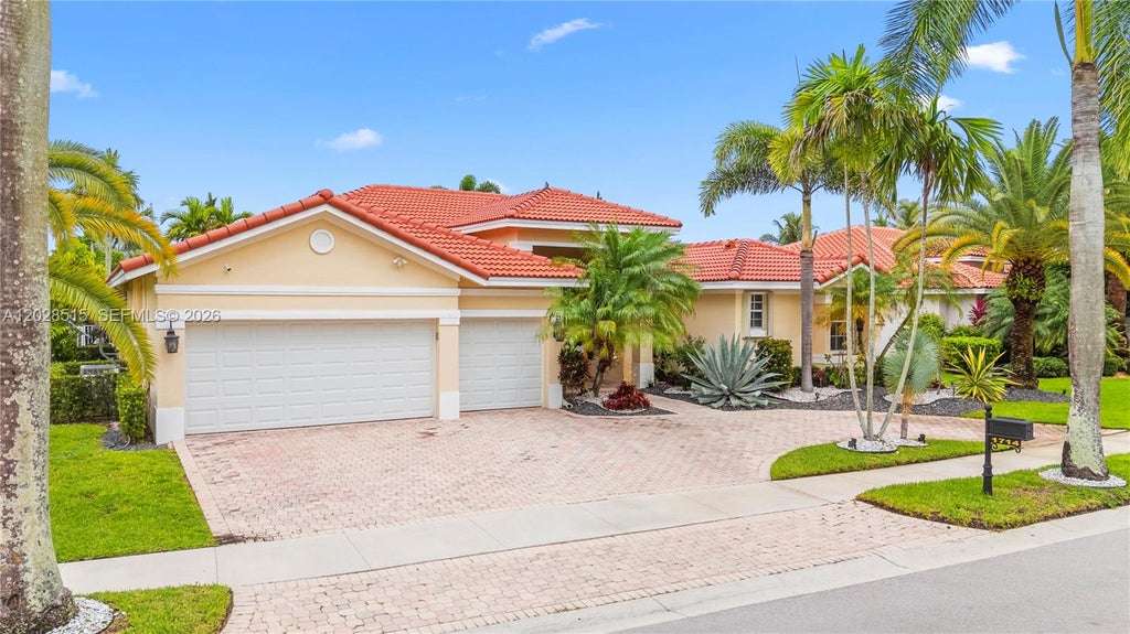 Photo of 1714 Victoria Pointe Cir, Weston, FL 33327 (MLS # A12028515)