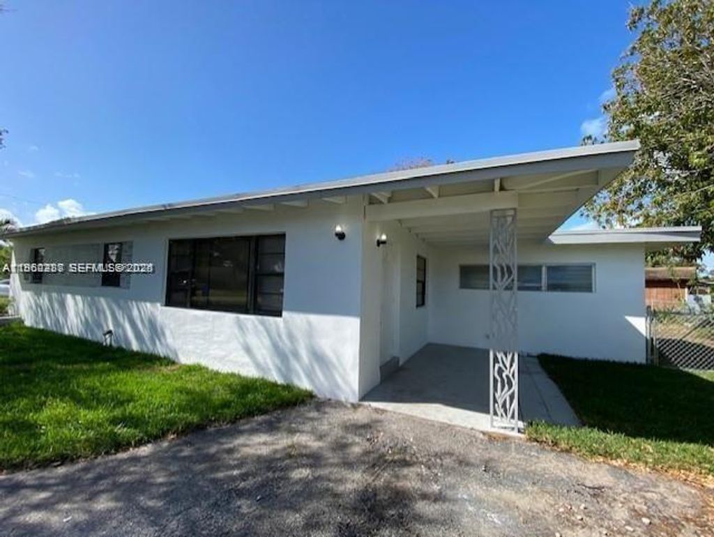 Photo of 411 SW 22nd Ave, Fort Lauderdale, FL 33312 (MLS # A11960287)