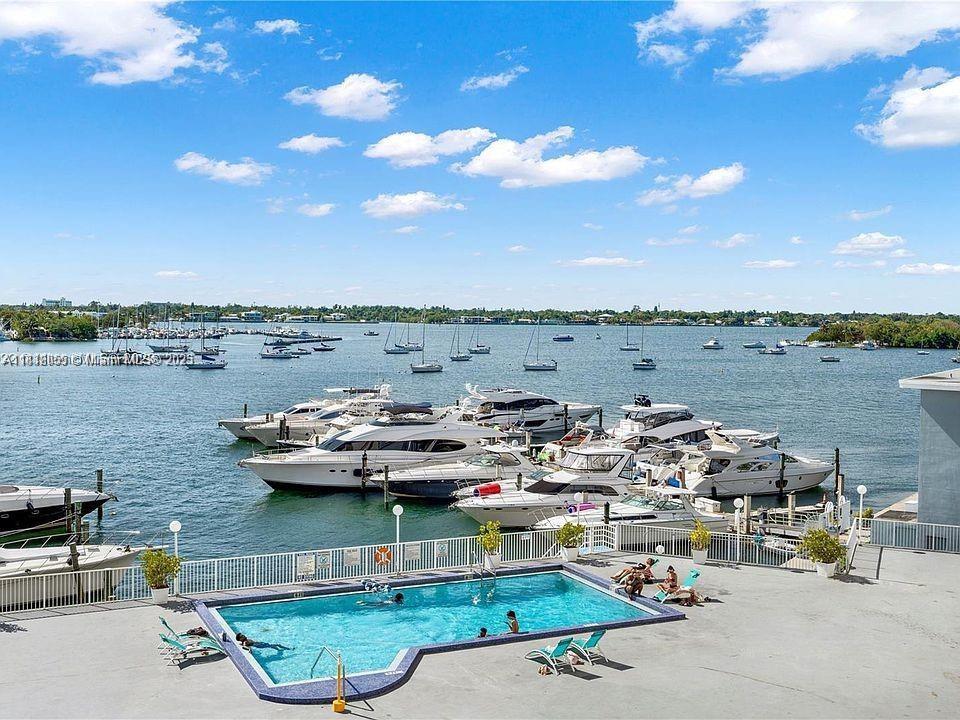 Nestled in the highly sought out North Bay Village with tons of restaurants, parks, and events near by! Newly remodeled bathroom. Unit gets tons of natural light through out. Pool overlooking the bay and marina. Must see!