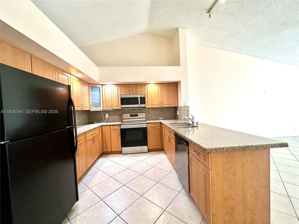 Photo of 3030 NW 116th Ave, Coral Springs, FL 33065 (MLS # A11926744)