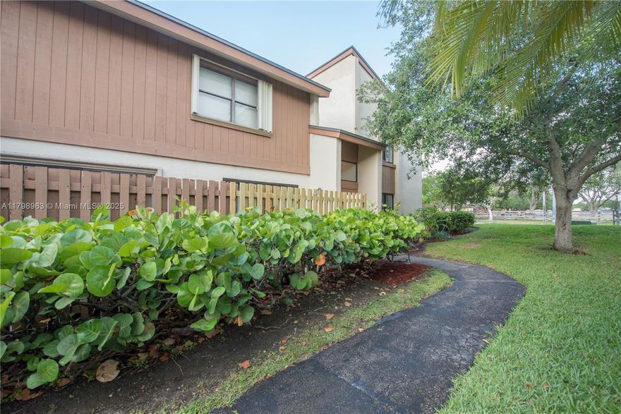 Better than new!  New roof and  Impact window in 2024.  Moving ready, brand new top of appliances! freshly painted, window treatments, updated bathrooms, large family room, could be converted to third bedroom!  Come and visit this property and make your home!!    The Great Community of Sabal Chase offers wonderful amenities Clubhouse, heater pool, tennis courts and park setting!  The association takes care of the roof, termite, and basic  cable. landscaping!  Easy living in a prime area of Kendall!  Walk to William H. Lehman Elementary,  Close to Turnpike, shopping!