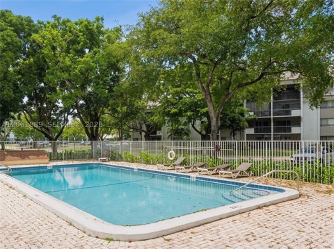 Photo of 731 N Pine Island Rd #102, Plantation, FL 33324 (MLS # A12061889)