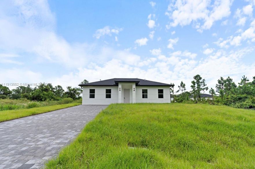 Rental property Ideal for Families or Investors un Lehigh Acres FL. Spacious and modern 4-bedrroom,3-bathroom home located in a quiet area with excellent access to Lehigh acres main roads. The property offers a very functional layout, ideal for a large family or two families who wish to share .as it can be easily divided by closing an interior door creating two completely independent spaces. Main Unit 3b bedrooms 2 full bathrooms, spacious open concept living and dining room, modem kitchen with included appliances, separate laundry area. Secondary Unit 1 bedroom,1 full bathroom small kitchenette, cozy living room ,perfect as a private area or for guests, Ideal for extended families or generate additional income. Located ,close to schools shops and parks.