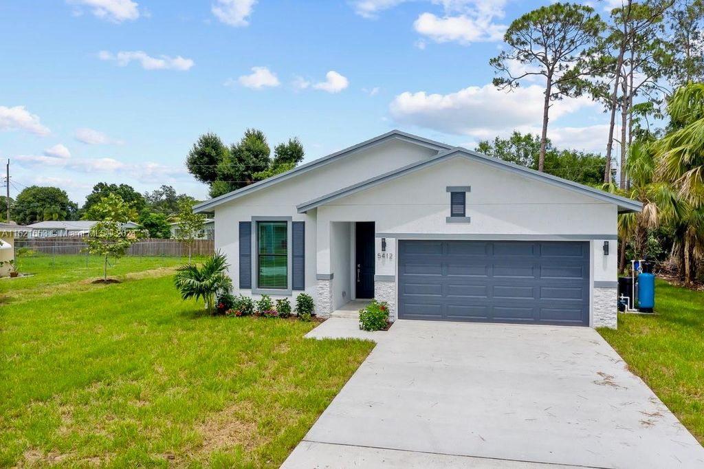 Photo of 7702 Deer Park Ave, Fort Pierce, FL 34951 (MLS # A11521653)