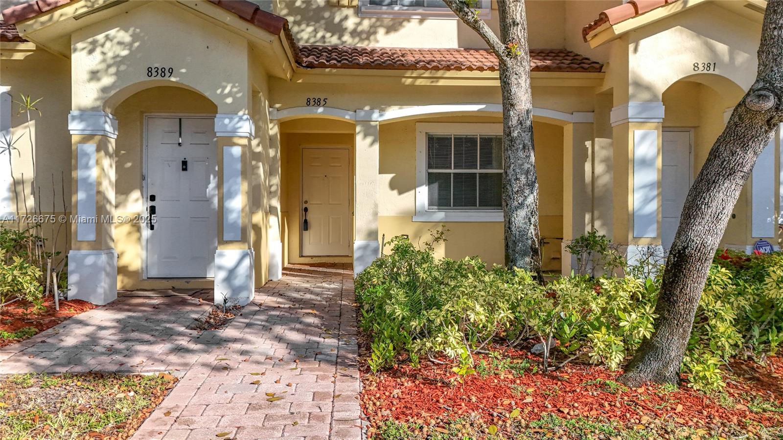 This community has numerous amenities available for residents to enjoy! Come enjoy this newer gated community with 24 hours security, gym, clubhouse, tennis courts, playgrounds and pool. The townhouse is 2 stories, and closely located to the clubhouse and pool, with partial view of lake. There are tiles at the bottom floor and bathrooms, with beautiful laminate on the stairs and top floor. It has recently been painted in neutral colors, and the unit is very clean. New kitchen cabinet doors were installed for a lovely new home look. HOA covers roof maintenance/replacement & insurance. This community is in a prime location near top schools, parks, and highways for easy access to Miami & Ft. Lauderdale, and the beaches.