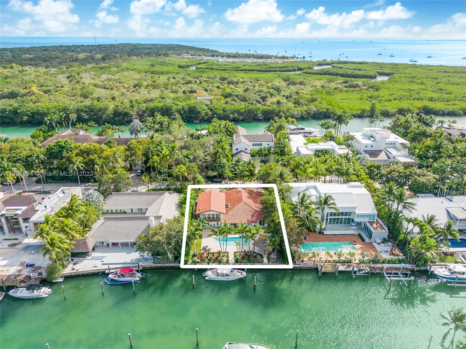 Best waterfront value on Key Biscayne! No bridges to bay & 88 feet on the water. Accommodates large yachts (turning basin). This lovingly maintained home on a no-traffic street is in excellent condition. This property is an excellent value surrounded by homes in the $20-$30 million plus range. Excellent home for entertaining with pool, generous patio area and gazebo by the water! Impact windows throughout. Ultra secure location at the end of Key Biscayne next to Bill Baggs Cape Florida State Park. Take your boat around the corner for lunch, dinner or drinks at Boater's Grill or The Cleat. Update and add value, build a modern masterpiece, rent it out for $20,000 plus or move right in to this beautifully maintained ocean access home. No mangroves or seaweed buildup at this property.