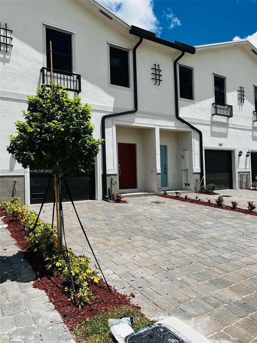 Spacious new construction townhouse featuring 3 bedrooms, 2.5 bath and one car garage. Open design kitchen with beautiful garden views. SS appliances. Large kitchen island. All bedrooms are in second floor. Carpet upstairs, owner providing the famous Rainbow vacuum to the tenant to facilitate the cleaning of the unit. Smart home system. Proximity to US1, Florida keys and Outlets. No pets.