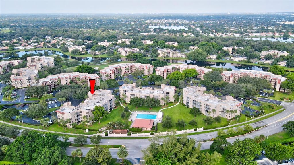 Photo of 1920 Sabal Palm Dr #104, Davie, FL 33324 (MLS # A12028180)