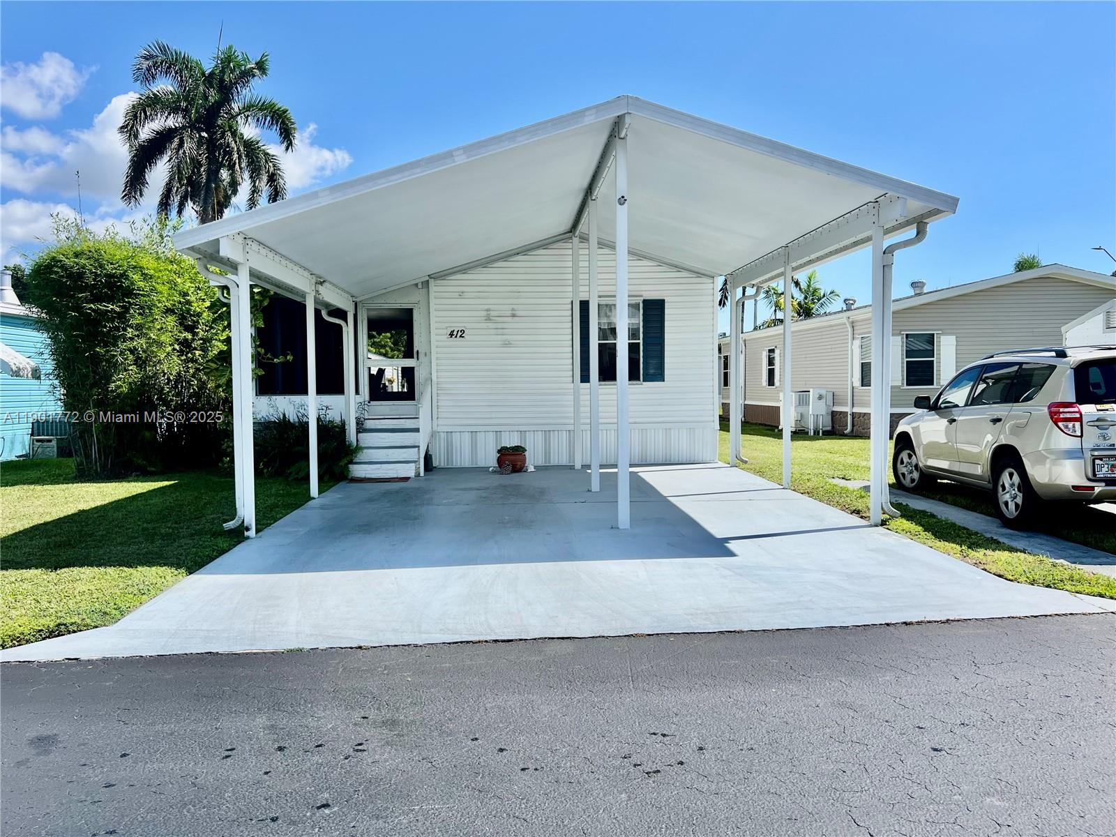 Welcome to this charming 2/2 split floor plan mobile home located in “Gateway West” 55+ community. This home offers a comfortable and functional layout, providing privacy with bedrooms on opposite sides. Enjoy relaxing in the bright and open living area. This lot has 3 additional sheds. One with electricity and an A/C for cooling, the others great for storage. You can take advantage of the community pool and a convenient storage area for your RV or boat. Whether you’re looking for a full-time residence or a peaceful seasonal retreat, this property offers easy Florida living at its best!