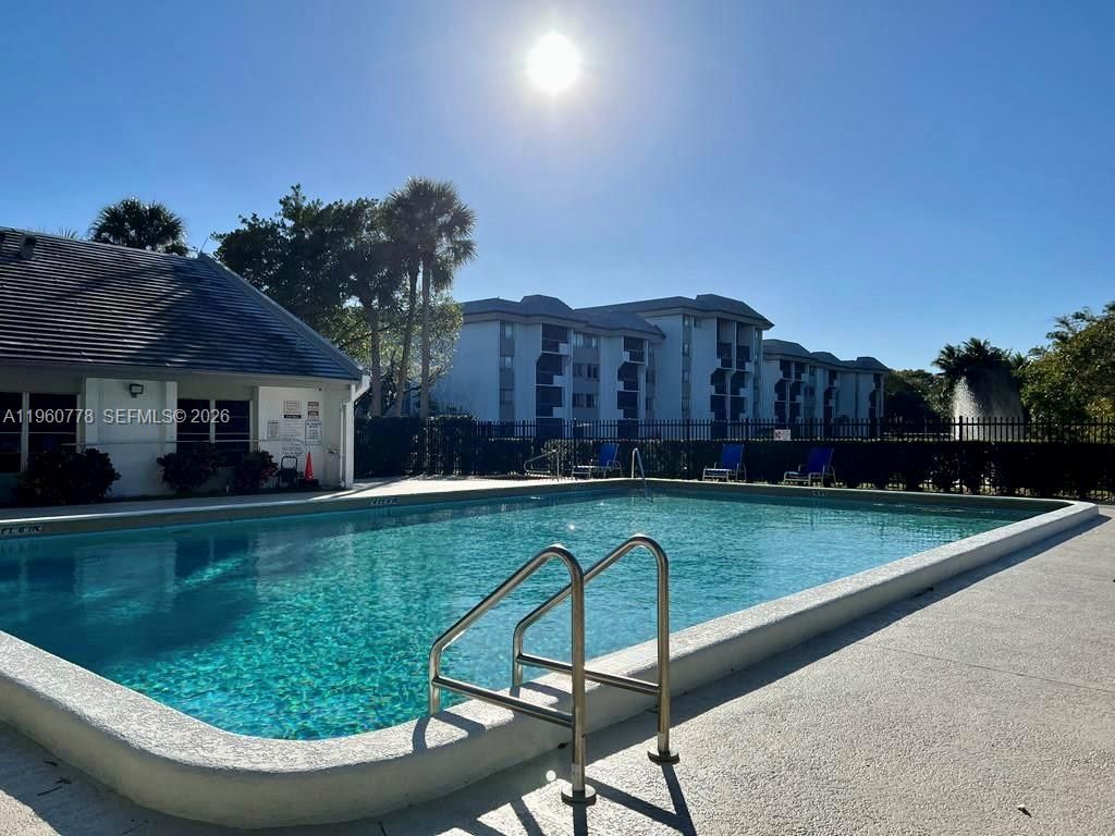 Photo of 721 N Pine Island Rd #302, Plantation, FL 33324 (MLS # A11960778)