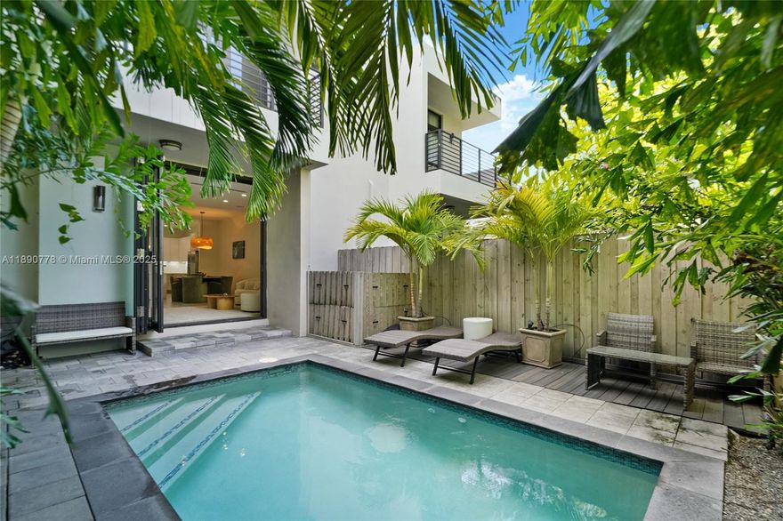 BEST VALUE ON HIBISCUS ST. Repositioned to sell, this tropical modern townhouse offers 3 bedrooms and 2.5 baths with a thoughtfully designed floor plan featuring volume ceilings, spacious closets, an upstairs laundry closet, and a rolling impact glass accordion door for seamless indoor/outdoor entertaining. The primary suite includes a brand-new spa-like bathroom and private balcony, while the two guest suites are bright and generously sized. Additional upgrades include a new AC and new dishwasher.

Outside, enjoy a private pool and lush landscaping that create a true oasis in the heart of Coconut Grove. Located steps from top dining, shops, and parks, this residence offers the perfect blend of modern comfort, privacy, and prime Grove living.

An outstanding opportunity in today’s market.