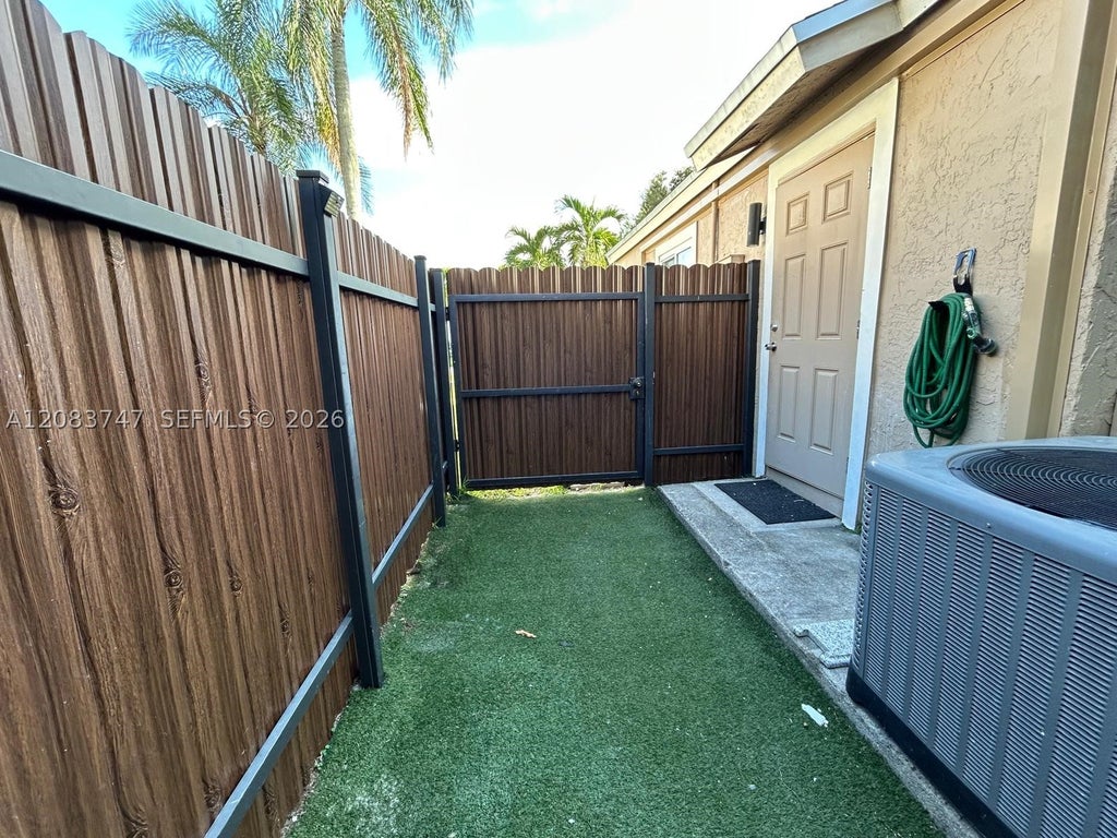 Photo of 13431 SW 9th Pl #1, Davie, FL 33325 (MLS # A12083747)