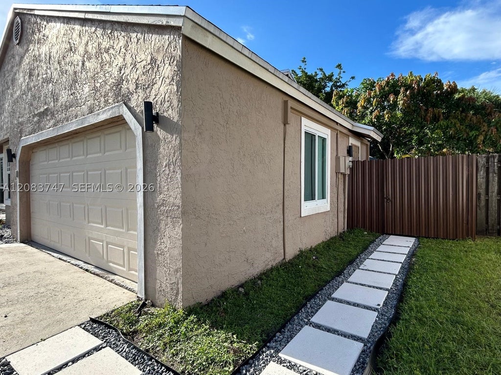 Photo of 13431 SW 9th Pl #1, Davie, FL 33325 (MLS # A12083747)