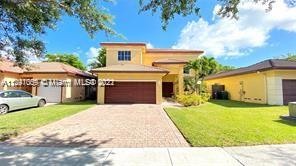 Nicely kept 2 story 3 bedrooms and 2 bathroom with a double car garage single family home in the beautiful Silver Palm community. High ceilings, tiled through out the first floor and laminate floors on the second floor. Spacious yard with concrete and room for a pool. Low HOA Fee, close to good schools and shopping centers. Minutes aways from black point Marina. Don't miss this opportunity.