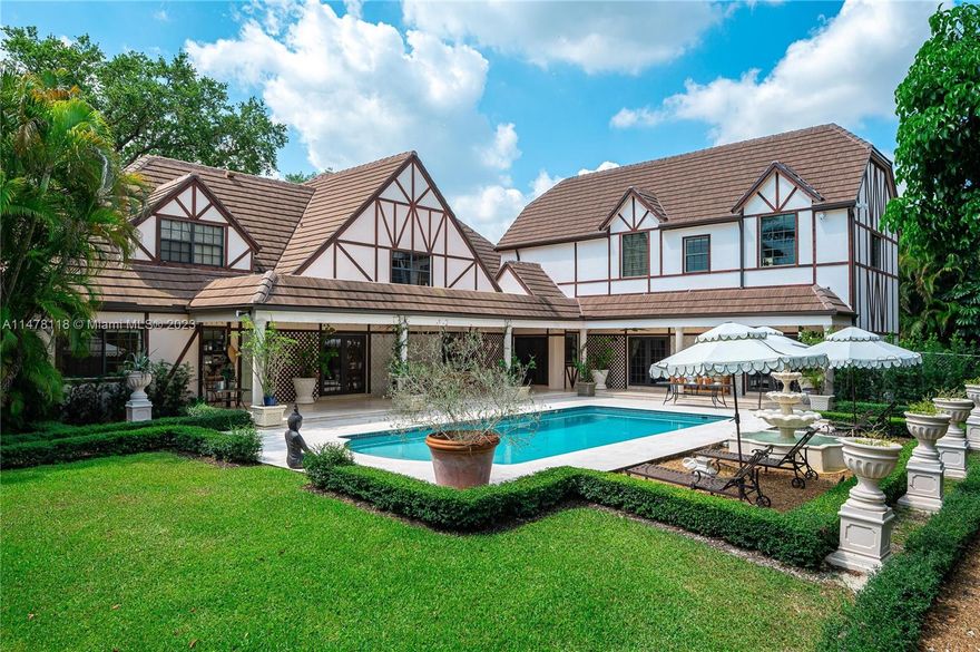 Beautiful 6 bedroom / 4.5 bathroom two story home located in private Pine Bay Estates community in the Gables. This property was recently upgraded and features marble floors throughout, walk-in closets in all bedrooms, spacious kitchen with state of the art appliances including a gas range stove. A stunning and spacious grand salon with high ceilings and crown moldings opens up to the outdoor space making it perfect for entertaining. Manicured English gardens with potager, fountains and a covered patio. Brand new generator, 2 car garage and full security system. Roof completed in 2018, all impact windows. Best value, Price per Square Foot for move-in ready home!