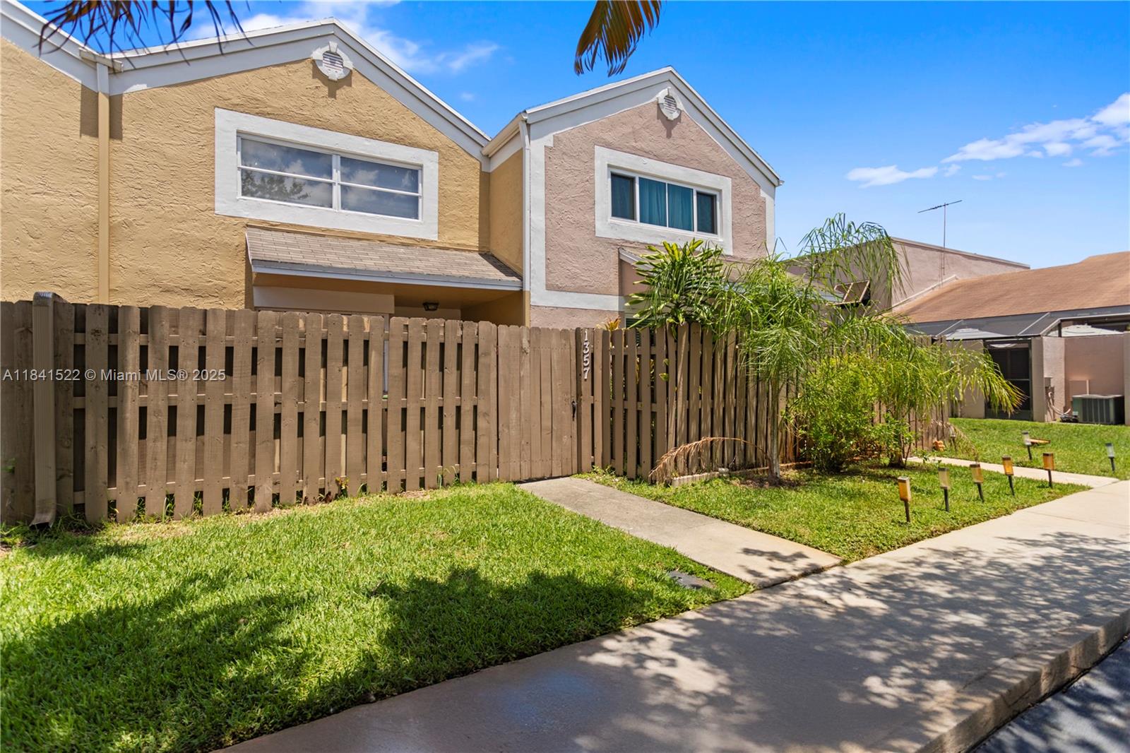 Beautiful 2-bed, 2.5-bath townhome in gated Flamingo Villas, Pembroke Pines! Screened-in back patio and private front yards. The comfort of a 2-story layout with tiled floors throughout the first floor, laminate on second floor. Features a spacious living/dining area and eat-in kitchen. Full-size washer/dryer included. Amenities: clubhouse, gym, sauna, hot tub, pool, tennis courts, and playground. Zoned for top-rated schools: Pembroke Lakes Elementary, Walter C. Young Middle, and Flanagan High. Pet-friendly (with restrictions). Near parks, shopping, dining, entertainment, hospitals, golf, and major roadways. Available now—schedule your private tour today!