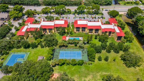 Photo of 2091 Coral Ridge Dr #N306, Coral Springs, FL 33071 (MLS # A11785645)