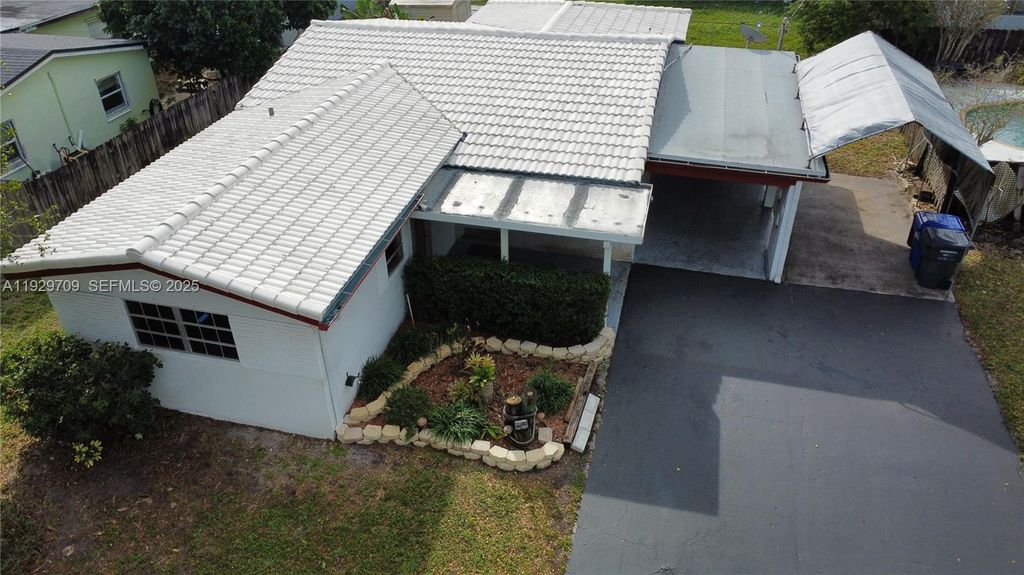 Photo of 6560 Sherman St, Hollywood, FL 33024 (MLS # A11929709)