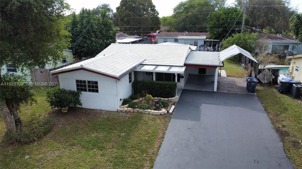 Photo of 6560 Sherman St, Hollywood, FL 33024 (MLS # A11929709)