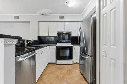 Tiny photo for 1721 Village Blvd #104, West Palm Beach, FL 33409 (MLS # A12042536)