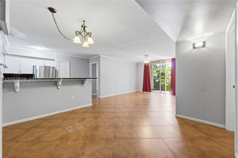 Tiny photo for 1721 Village Blvd #104, West Palm Beach, FL 33409 (MLS # A12042536)