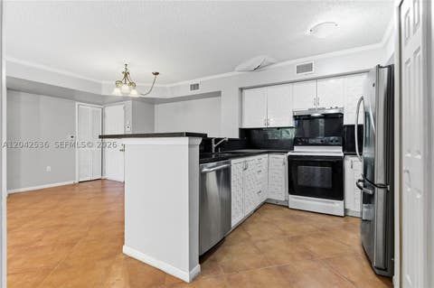 Tiny photo for 1721 Village Blvd #104, West Palm Beach, FL 33409 (MLS # A12042536)
