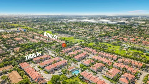 Photo of 5073 NW 114th Ct, Doral, FL 33178 (MLS # A12090729)