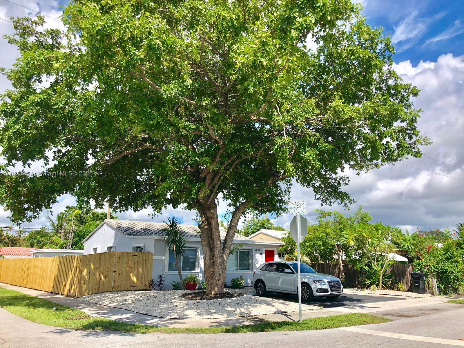 Stunning 5BR/3BA residence in the desirable South Middle River area, featuring a charming 1BR/1BA guest house with its own living room, full kitchen, private patio, separate entrance, and parking — ideal for Airbnb or additional rental income. The main home boasts impact windows, elegant finishes, spacious interiors, and ample parking. Perfectly located near to Downtown Fort Lauderdale, upscale dining, shopping, Ft. Lauderdale Airport, and the beach. A rare opportunity to own a versatile property offering style and excellent investment potential.