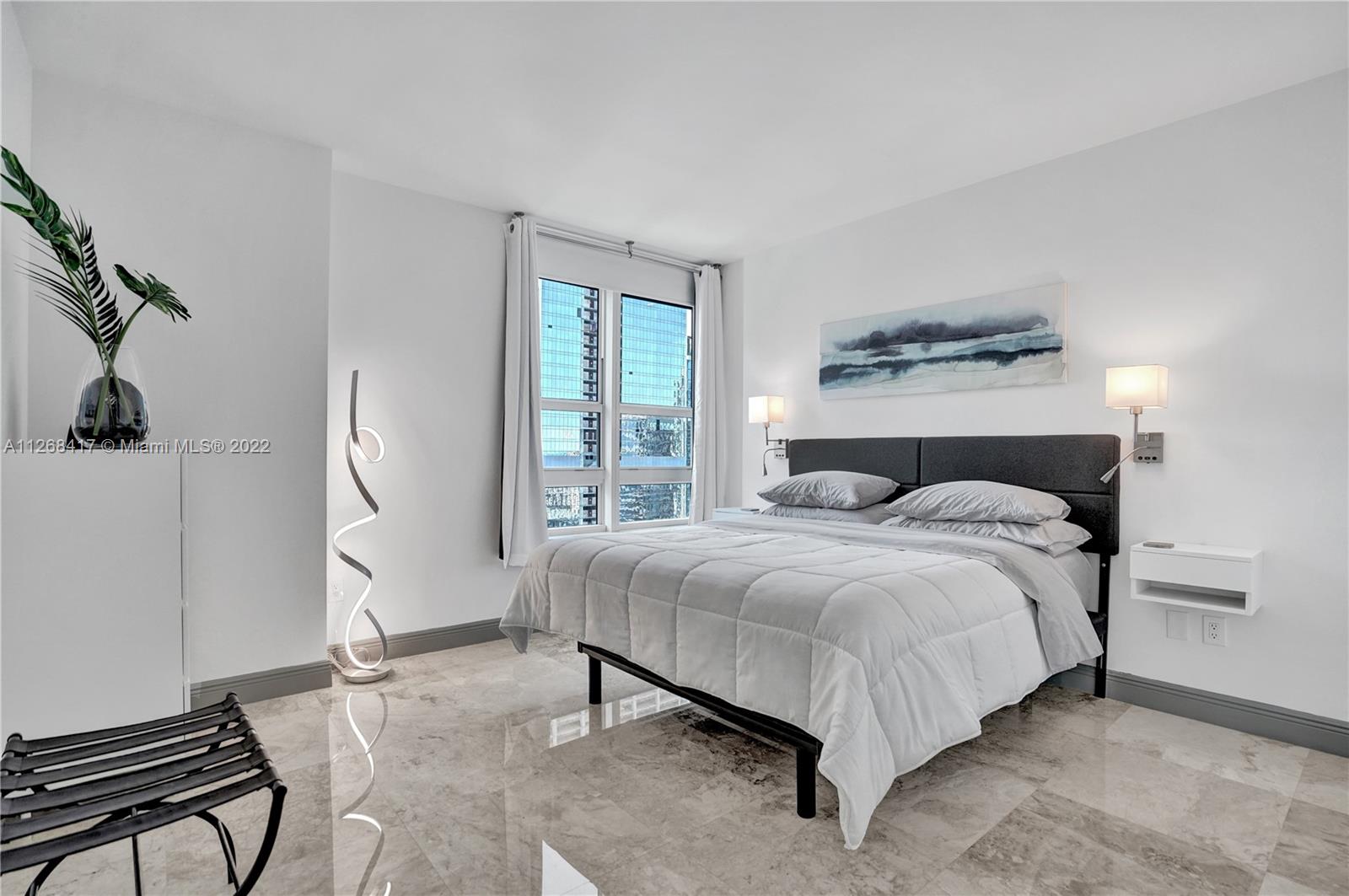 THE PLAZA 901 BRICKELL CO - Residential Lease
