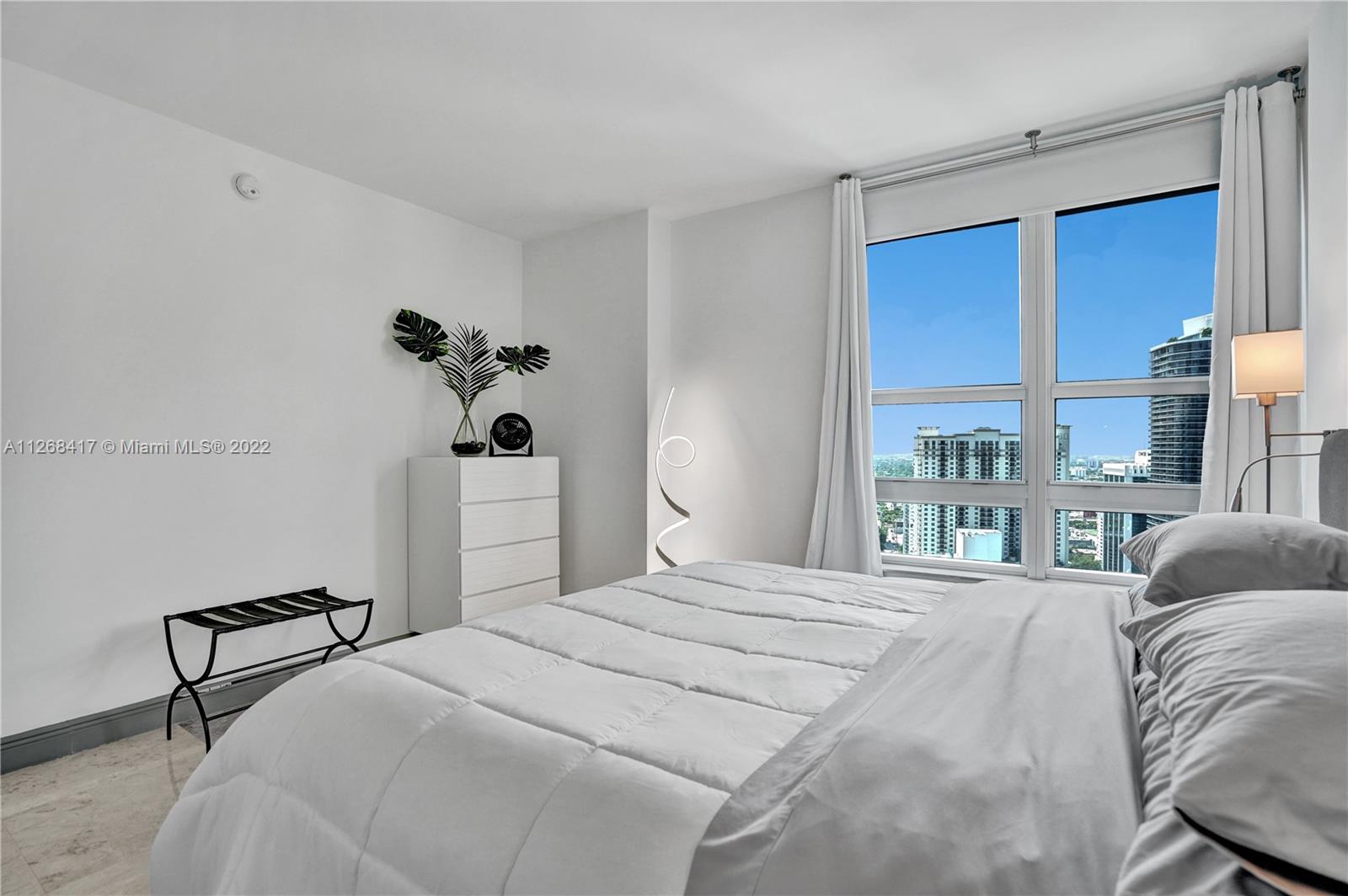 THE PLAZA 901 BRICKELL CO - Residential Lease