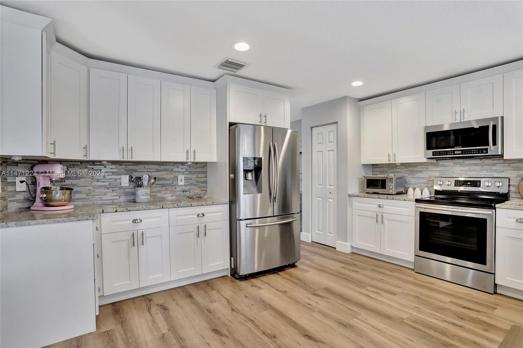 Photo of 4006 Crescent Creek St, Coconut Creek, FL 33073 (MLS # A11471224)