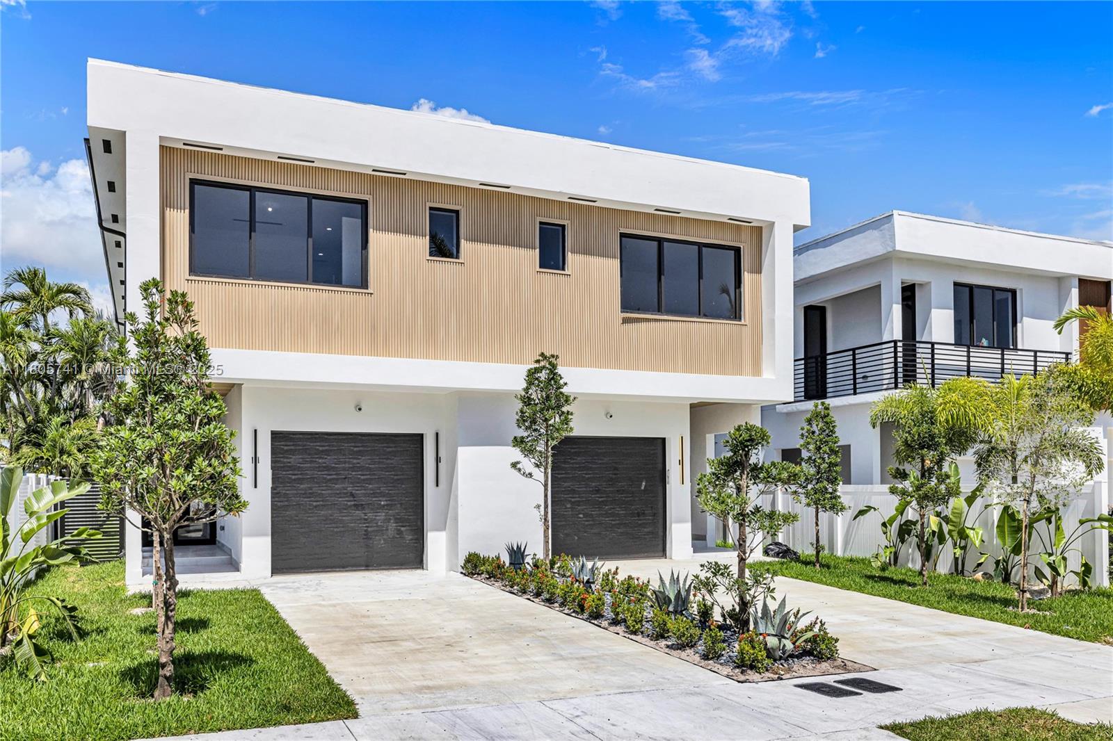 Modern Luxury Meets Incredible Value. RARE 4-bedroom, 5-bath new construction townhome offering 2,600 sq ft of thoughtfully designed living space. High-end finishes and an open layout, this home delivers the lifestyle of a luxury single-family residence at an exceptional price point. The modern chef’s kitchen is outfitted with top-of-the-line appliances, an oversized quartz island. The grand living room transitions with a seamless connection to the private backyard, where you’ll find an inviting patio, pool, and summer kitchen with a built-in grill. perfect for hosting year-round. Inside, you’ll find Italian tile throughout, spacious en-suite bedrooms, and a sleek, open layout. The primary suite is truly showstopping, offering grand scale, a spa-like bathroom, and a massive walk-in closet