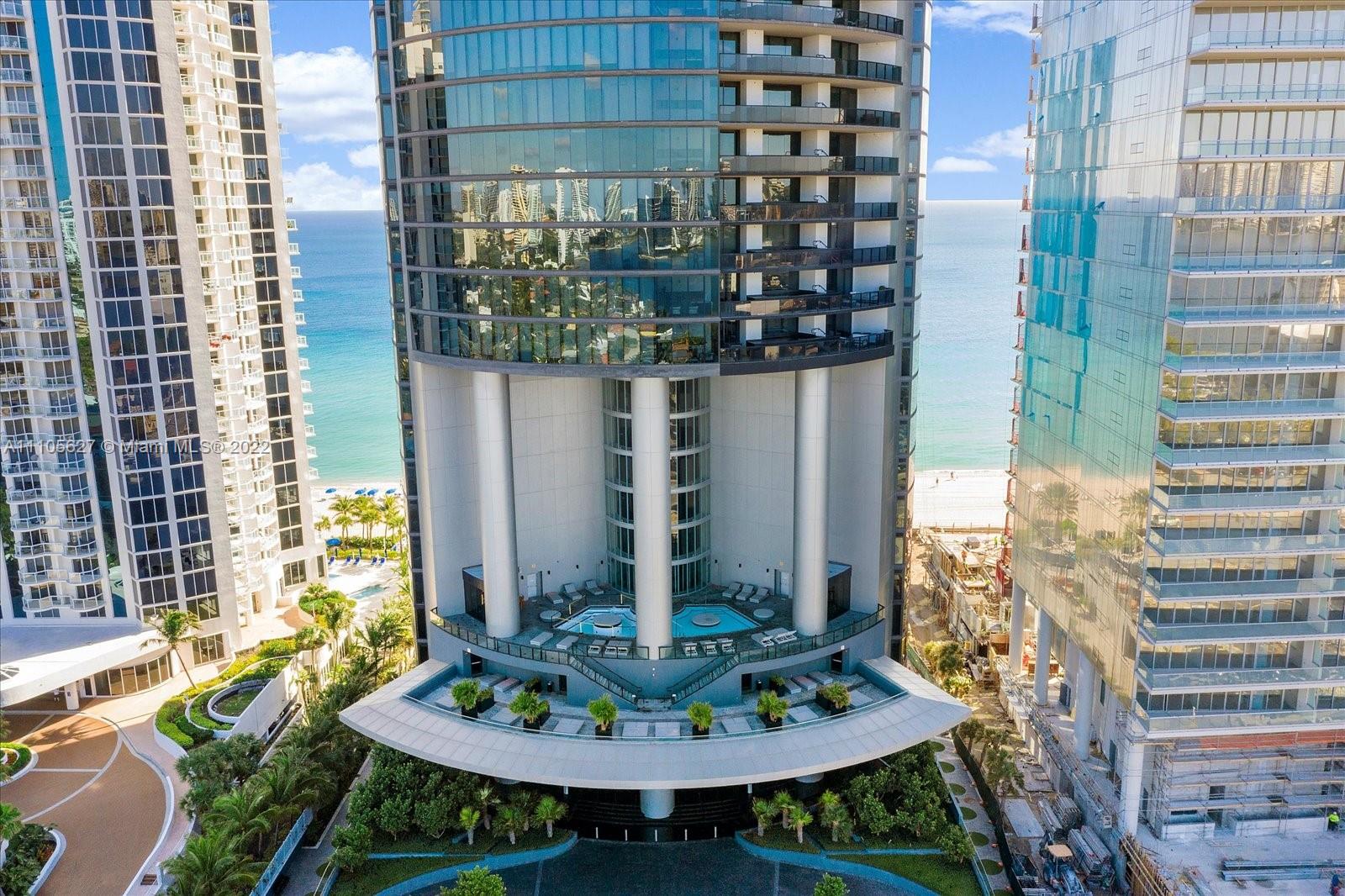 The most exciting part of this unit is being located on the world's first condominium complex with elevators that will take residents directly to their units while they are sitting in their cars. The 57-story building is made completely with glass to ensure that no view is compromised and all plans. Offer Spa / Gym and a lot of other entitlement amenities, Piano Lounge, Wine tasting area, restaurant. The unit faces the Intracoastal waterways. 2 car garage in your unit. Dramatic walls of tinted glass surround the living and dining area, kitchen, bedrooms, and baths Oversized Balconies include private splash pools (10 x 15). Summer Kitchens on the Terraces and much more