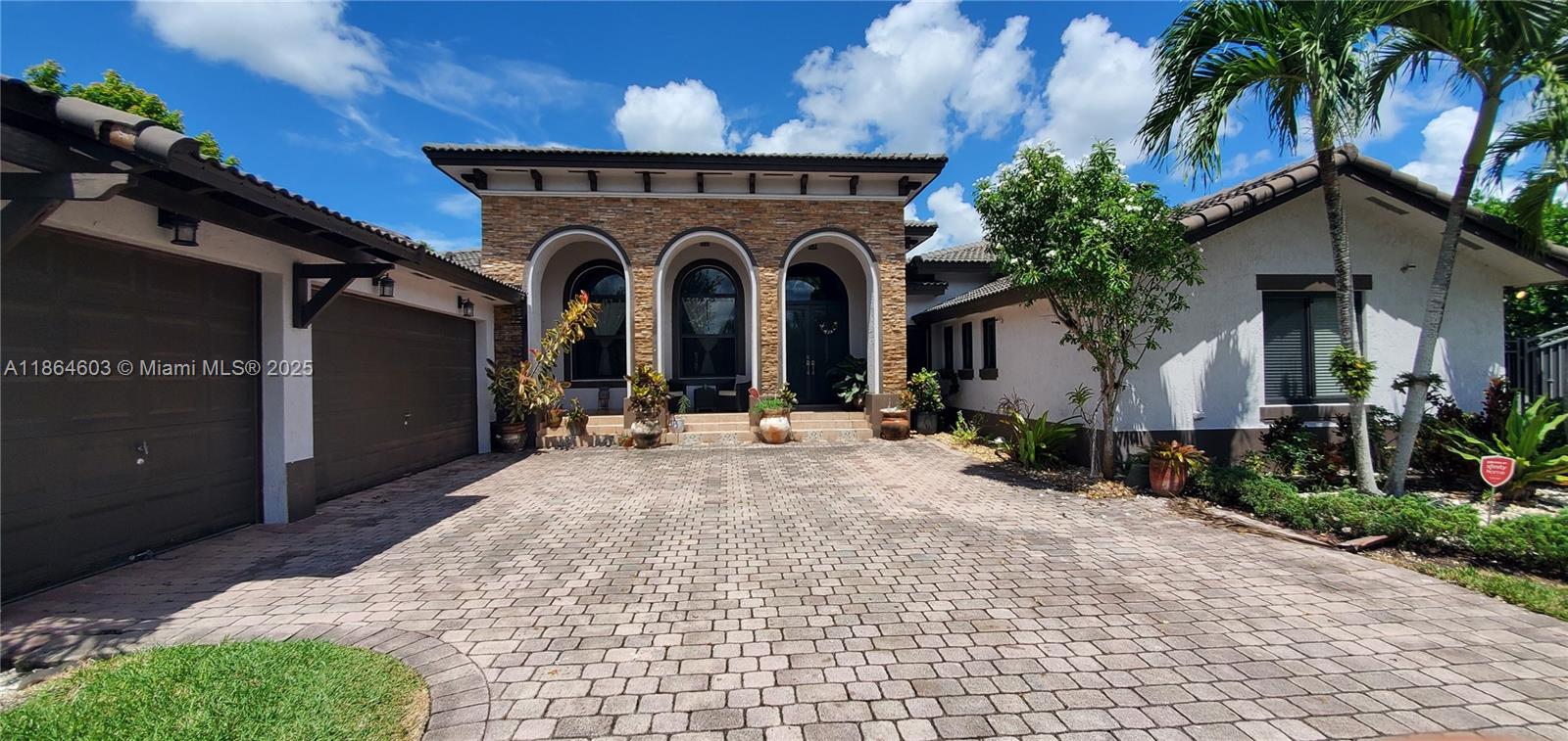 Presented by Estatewide Properties. Elegant Mediterranean Estate on ¼ Acre with 3-Car Garage & Gazebos! Offering 3,390 SF living (4,530 total) near Florida’s Turnpike, this 5 bed, 4 bath home features soaring 18’ ceilings, a split floor plan, huge master suite, large family room, and full 3-car garage. Extended brick-paver driveway provides ample parking plus room for boat/RV. Private backyard with covered patio and two gazebos is perfect for entertaining or relaxing. Highlights include barrel tile roof, grand double-door entry, 8’ sliding glass doors, designer tile, and decorative paver walkways. Spacious lot with room for pool/sundeck. A must-see in a sought-after community!