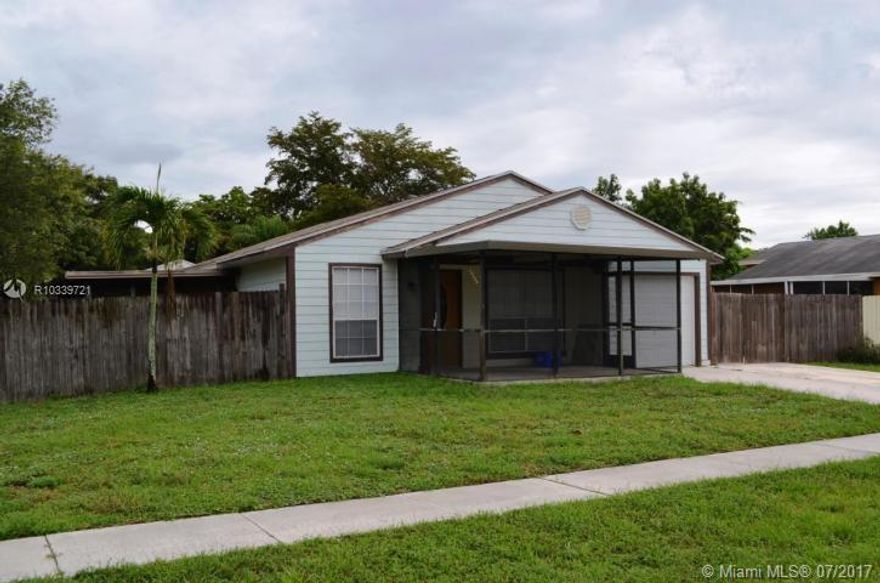 Wonderful large 3 Br, 2 Ba, 1cg, home with a Den or possible 4th bedroom. This home has a large fenced yard with room to park your boat or RV. You have 2 nice roofed and screened Porch and Patio areas to relax or to entertain, vaulted ceiling with spacious tiled living area, and a nice kitchen/dining area.  The rear bedroom could easily be used as an In-law suite. Located close to shopping, fine dining and entertainment.  Extra wide driveway for parking. poured slab in back yard ready for your storage unit