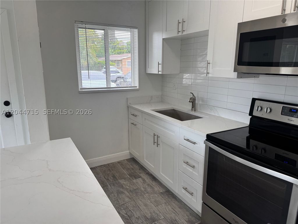 Photo of 495 NW 43rd Ct #1, Oakland Park, FL 33309 (MLS # A12044715)
