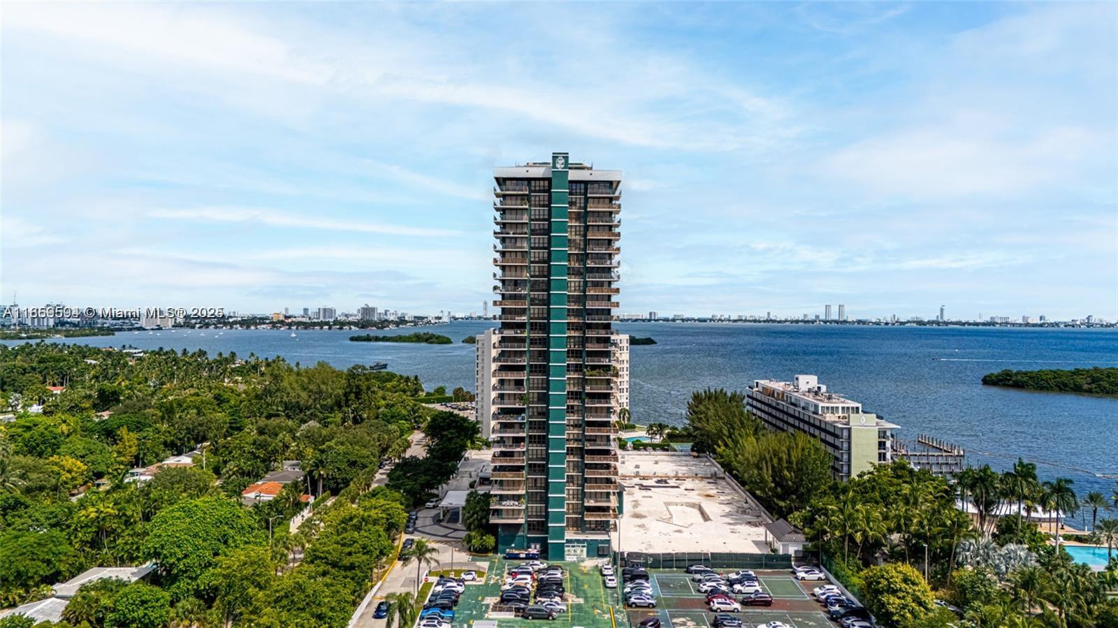 Beautiful upper penthouse in Miami with breathtaking unobstructed ocean and city views spanning from Sunrise to Sunset. Unique floor plan with 11"ceilings Gated Community, 24 h front desk, heated pool, W/steam & sauna, hot tub, fitness center, spa, 3 tennis courts & Pickleball, BBQ pavilion & Tiki hut, convenience store, entertainment rooms, library, office space. Tropical ground and Marina Deck. Hot Mimo district, 5 minutes to design district & Wynwood, 15 minutes to downtown, South Beach and airport.! Building is undergoing a complete remodeling including glass terraces, new lobby, new gym, etc. OK to lease first years of Ownership. Seller will pay all40 year certification assessement and terrace from the building at closing