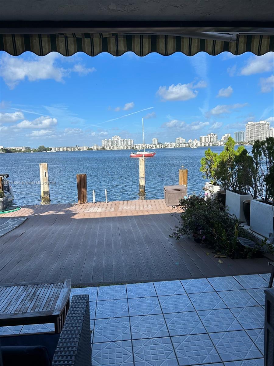 Discover two-level 3 bedroom 2,5 bath townhouse located in the heart of Lake Maule, North Miami which comes with a private dock space for a 23ft boat or more. It's amazing opportunity to own a waterfront townhouse with gorgeous views for this price! Enjoy a renovated gym, pool, relaxing sauna, lighted tennis court, and a nice party room in this well-maintained community.The unit offers direct ocean access and 2 parking spaces