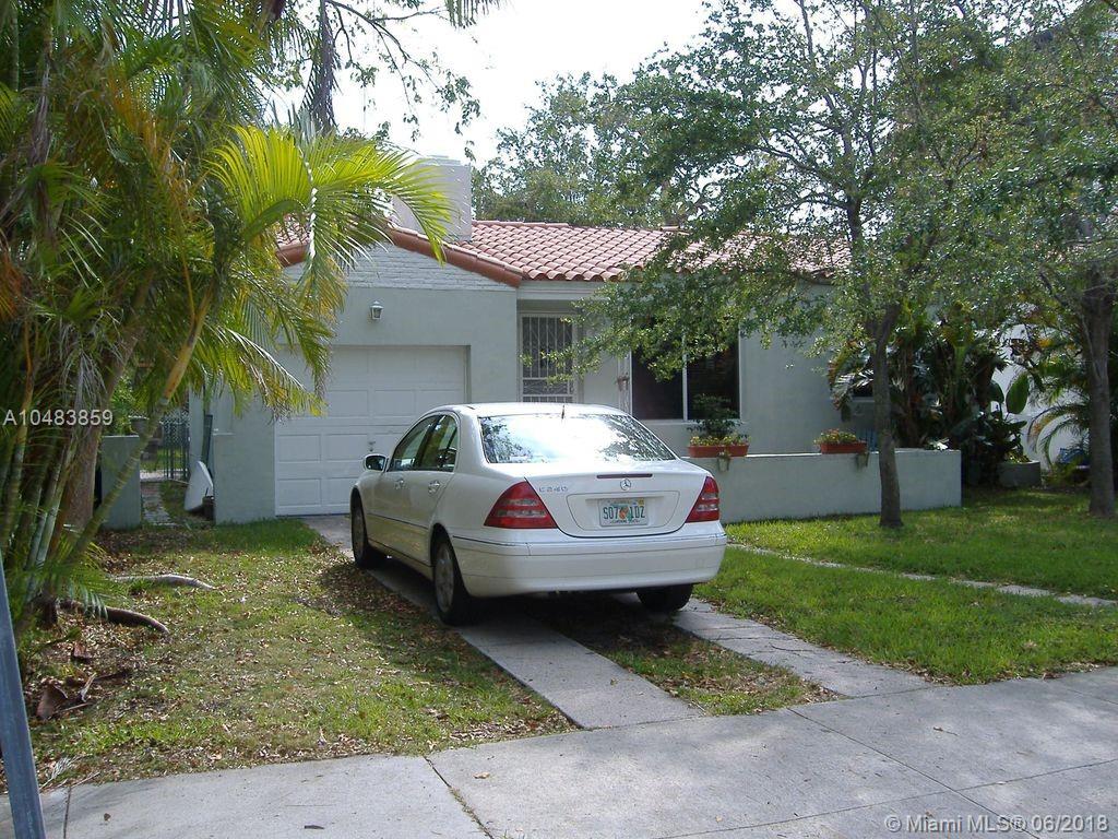LIVE IN THE ROADS!!! This beautiful Miami home features Old Spanish charm with its well maintained hardwood floors and an Art Deco fireplace. You will love the large fenced-in yard and the tropical setting. Just down the street is Coral Way, and 5 minutes from all that the Miami Brickell Area has to offer. Want to go to the beach? Want to go to Key Biscayne, Coral Gables, Coconut Grove, Downtown Miami, Mary Brickell Village? All are only minutes away.
Don't miss the opportunity to make this house your home. Make your appointment now before it's too late!