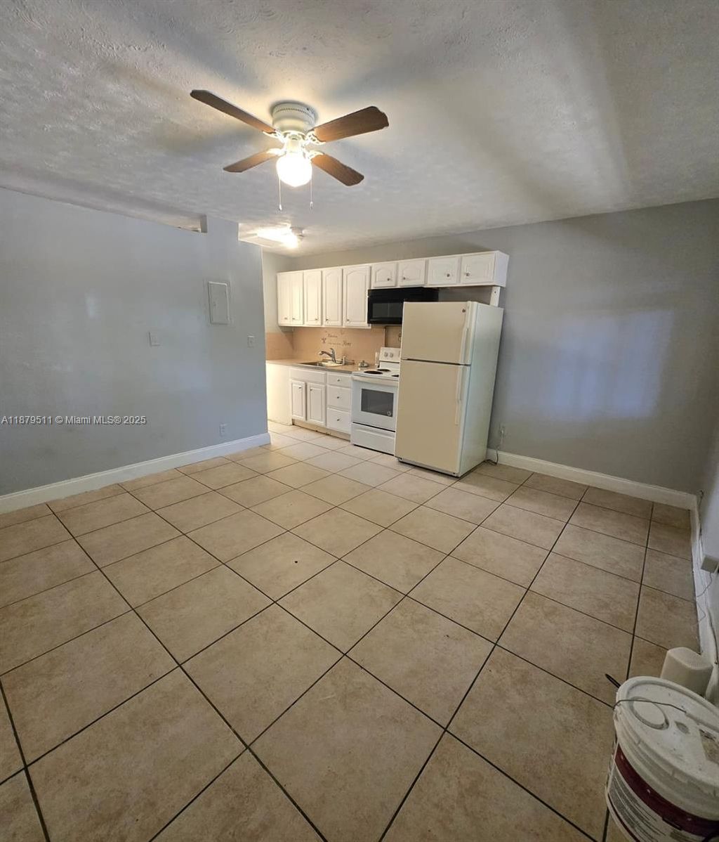 Photo of 3981 SW 12th Pl #2, Fort Lauderdale, FL 33312 (MLS # A11879511)