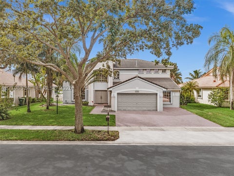 Photo of 2048 NW 126th Ave, Pembroke Pines, FL 33028 (MLS # A12106524)