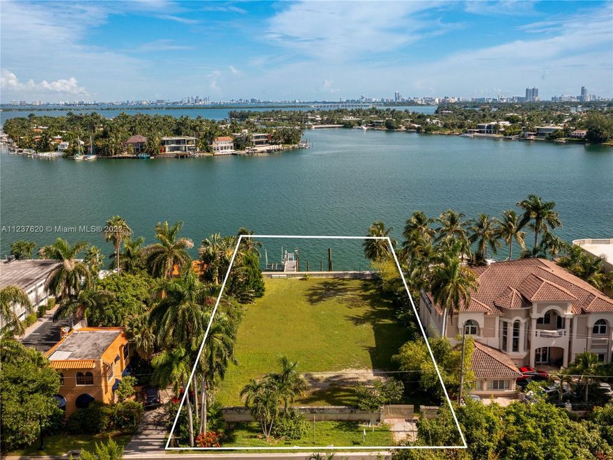 PRIME WATERFRONT LOT on Hibiscus Island in Miami Beach offered with approved plans for a modern home with architecture by Kobi Karp! This incredible 15,750-SF lot with 90 feet of wide waterfrontage already has a new elevated seawall with a new pier dock and boat lift for docking multiple boats. Fabulous views of the Edgewater skyline, Biscayne Bay, and lush Venetian Islands can be enjoyed from this secluded paradise. Hibiscus Island is located centrally and ideally between Miami Beach and Miami, offering quick access to some of the best restaurants, entertainment and cultural centers, sports venues, and beaches