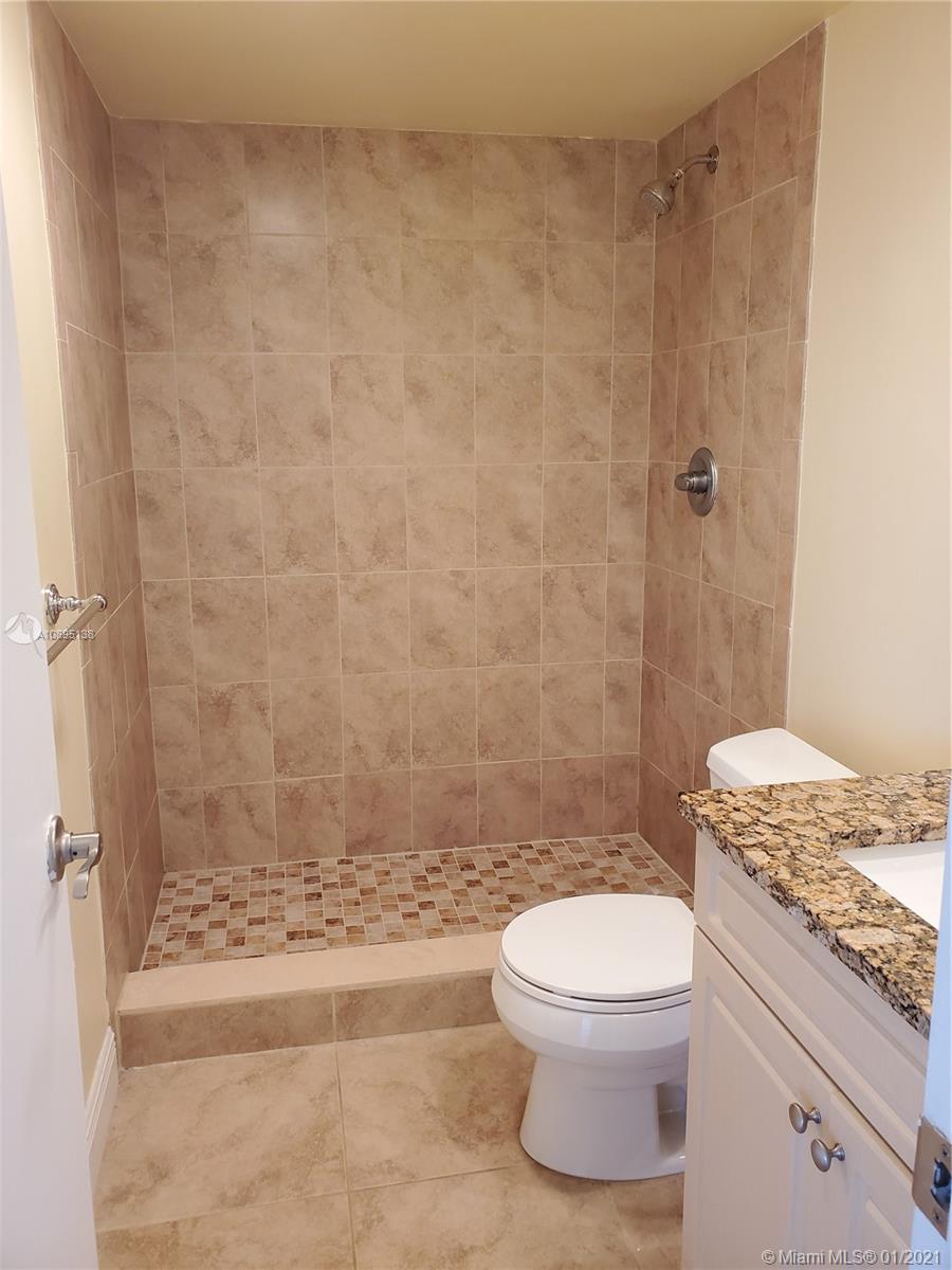 PALM-AIRE C C APTS 49 CON - Residential Lease