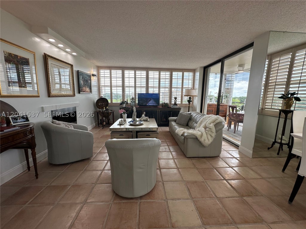 Photo of 1200 Saint Charles Pl #618, Pembroke Pines, FL 33026 (MLS # A12041537)