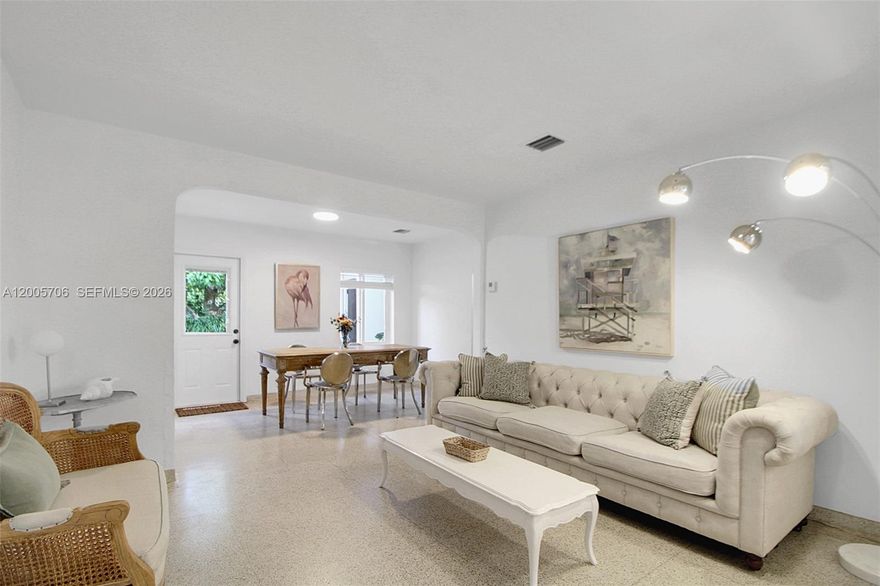 Own in the Heart of the Design District! Charming and bright home. Cross the street and you are in Miami’s premier shopping area and minutes from the beach. Features include remodeled bathrooms, impact windows and doors, charming terrazzo floors, and a one-car garage that can easily be made an additional room. The versatile foyer is ideal as an office or library. Enjoy several fruit trees including the shade of a delicious mango tree on a spacious 7,500 sq. ft. lot. Including a new A/C with updated ductwork, fully upgraded electrical system. Home
sits on Solid concrete Foundation. Exceptional location near Michelin-starred dining, world-class entertainment, 3 minutes to Target, Upper Buenavista, Edgewater, Magnolia Park and near MIA Airport. City living in a Quaint residential setting is here!