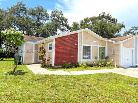 Photo of 9850 W Heather Ln, Miramar, FL 33025 (MLS # A12050533)