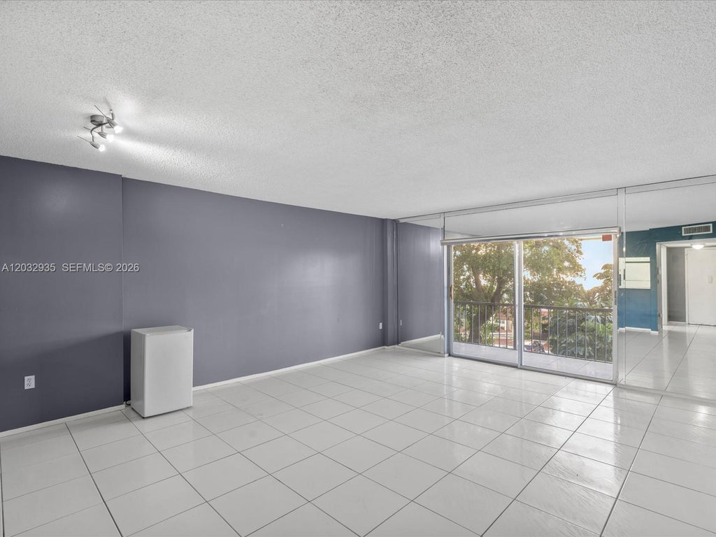 Photo of 4172 Inverrary Dr #306, Lauderhill, FL 33319 (MLS # A12032935)